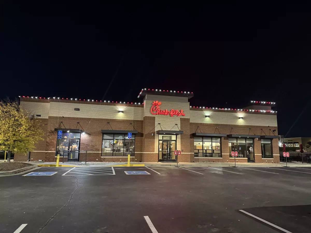 Restaurant with red and white C9 lights along the whole roofline and entry tower